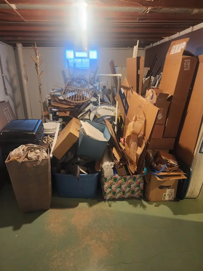 Roll-off dumpster container at job site for 8 Yard Dumpster Rental in Carolina Beach